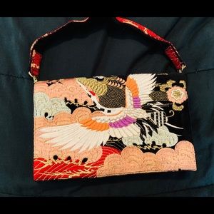 Zara embroidered velvet bag with bird detail.